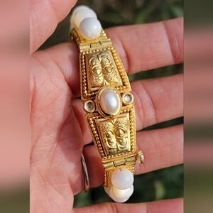 Absolutely stunning large white cat's eye gold and pearl screw statement bangle